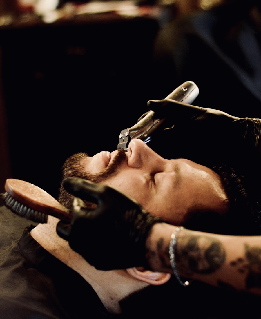 A Sharp and Co. barber lining up a fresh skin fade at the chair.