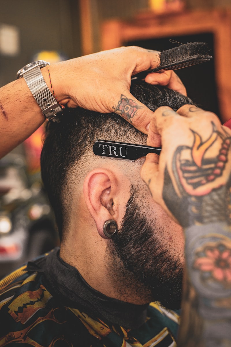 Close skin fade being cut with clippers at Sharp and Co.