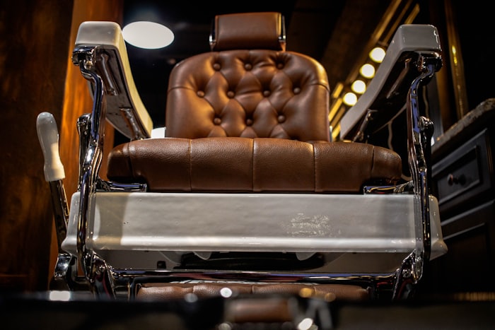 A classic leather barber chair at Sharp and Co.